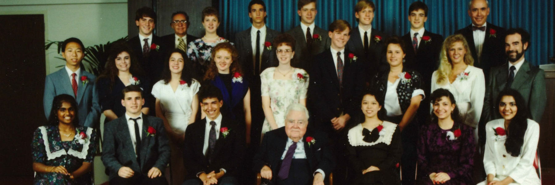 The 1991 class of Wells Scholars in formal attire with Chancellor Wells in the center. 